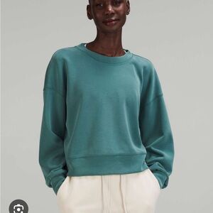 Lululemon softstreme perfectly oversized crew in size 2. Color Green Jasper